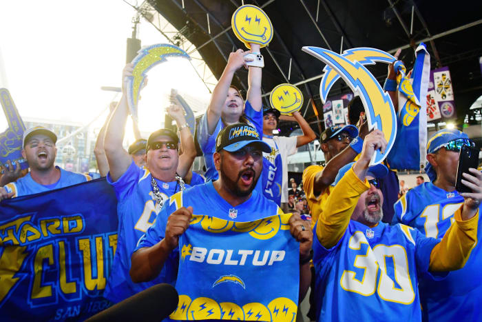 Apr 28, 2022; Las Vegas, NV, USA; Fans react after Boston College guard Zion Johnson was selected as the sixteenth overall pick to the Los Angeles Chargers during the first round of the 2022 NFL Draft at the NFL Draft Theater. Mandatory Credit: Gary Vasquez-USA TODAY Sports